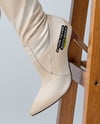 Pair of Over-The-Knee Boots on Women's Legs with Dress Mockup