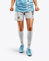 Female Soccer Player Wearing Jersey and Shorts Mockup