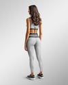 Woman Wearing a Crop Top and Leggings Mockup