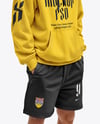 Young Man Wearing Oversize Hoodie and Shorts Mockup