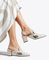 Pair of Suede Mules on Woman's Legs Mockup