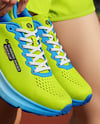 Pair of Running Shoes in Woman's Hand Mockup