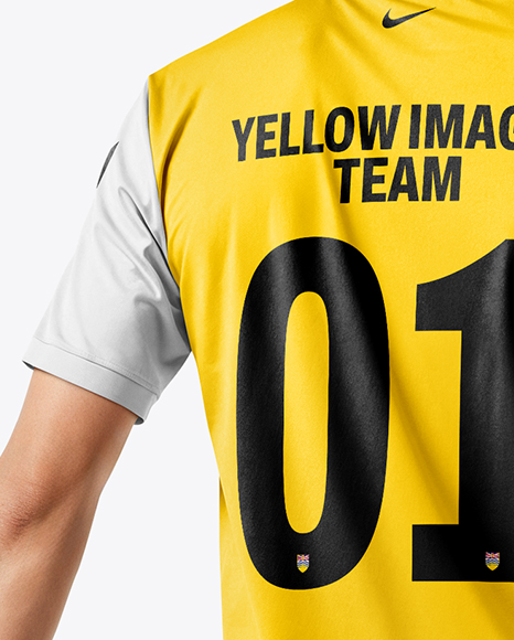 Man Wearing Soccer Jersey and Shorts Mockup