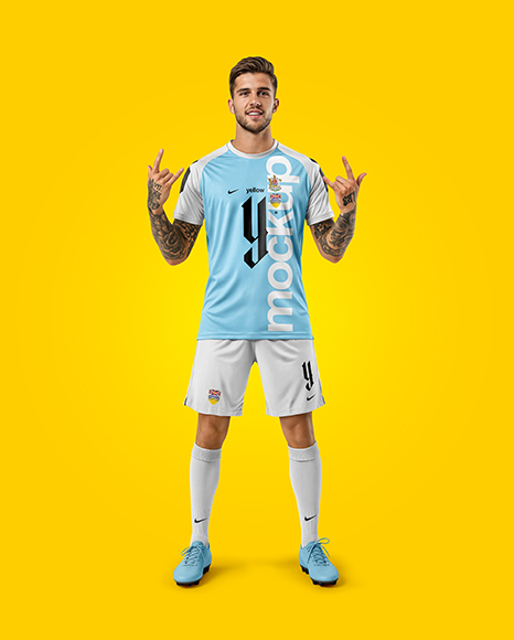 Man Wearing Soccer Jersey and Shorts Mockup