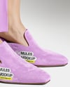 Pair of Suede Mules on Woman's Legs Mockup