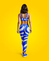 Woman Wearing a Crop Top and Leggings Mockup