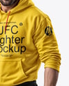 Male UFC Fighter Wearing Hoodie and Shorts Mockup