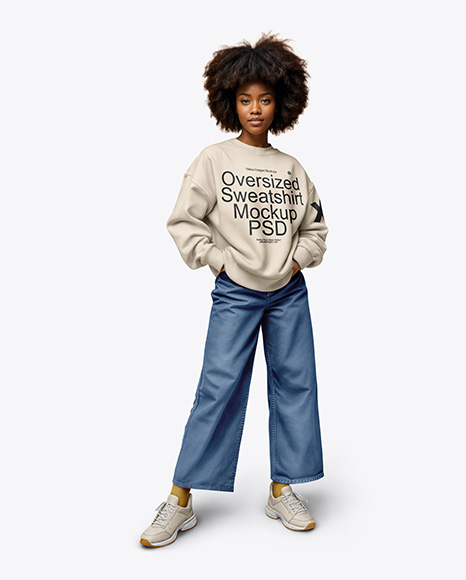 Black Woman Wearing an Oversize Sweatshirt and Jeans Mockup - Crop top hoodie mockup