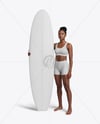 Woman Wearing Sports Bra and Shorts Holding Surfboard Mockup