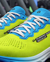 Pair of Running Shoes on Treadmill Mockup