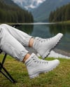 Pair of Hiking Boots on Woman's Legs Mockup