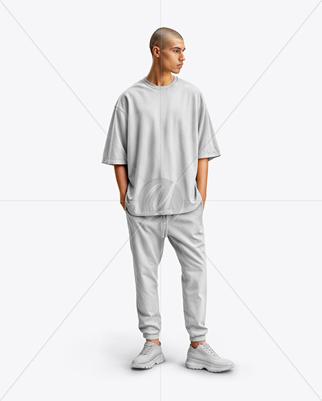 Man Wearing an Oversize T-shirt and Sweatpants Mockup