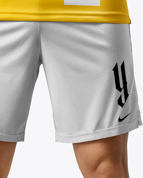 Soccer Player Wearing Jersey and Shorts Mockup