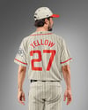 Baseball Player Wearing a Jersey and Cap Mockup