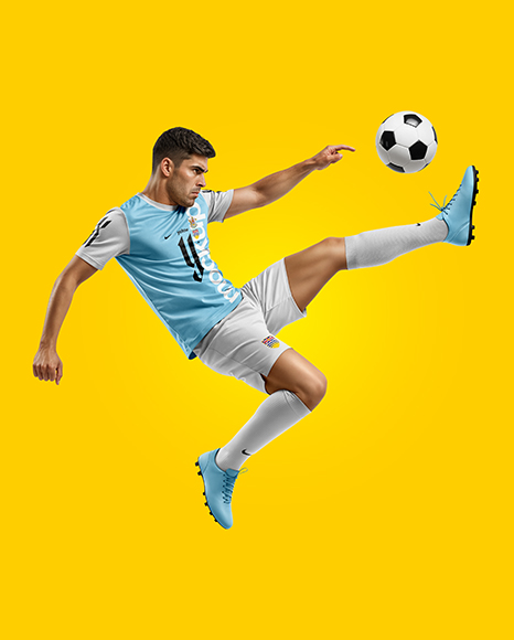 Man Wearing Soccer Jersey and Shorts Mockup