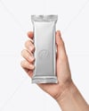 Metallic Snack Bar in a Hand Mockup