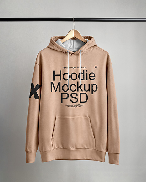 Hoodie on a Wooden Hanger Against a Plain Background Mockup