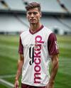 Soccer Player Wearing a Jersey and Shorts at the Stadium Mockup