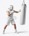 Man Wearing Boxing Sleeveless Hoodie and Shorts with Punching Bag Mockup