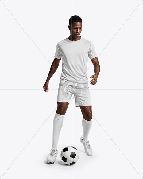 Soccer Player Wearing Raglan Jersey and Shorts Mockup