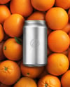 12oz Drink Can on a Stack of Oranges Mockup