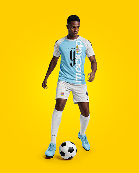 Soccer Player Wearing Raglan Jersey and Shorts Mockup