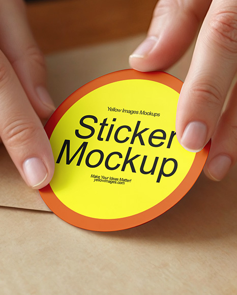 Round Sticker in a Hands Mockup
