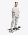 Girl Wearing T-Shirt and Cargo Pants with Skateboard Mockup