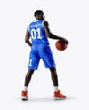 Basketball Player Wearing Jersey and Shorts with Basketball Mockup