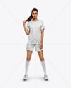 Female Soccer Player Wearing Jersey and Shorts Mockup