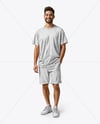 Young Man Wearing T-shirt and Shorts Mockup