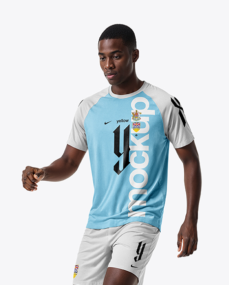 Soccer Player Wearing Raglan Jersey and Shorts Mockup