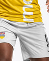 Soccer Player Wearing Raglan Jersey and Shorts Mockup
