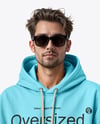 Young Man Wearing Oversize Hoodie and Pants Mockup