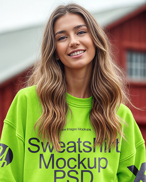 Young Woman in Sweatshirt Standing on Hay Block with Pumpkins Around Mockup
