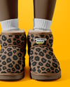 Pair of UGG Boots on Woman's Legs with Leggings Mockup