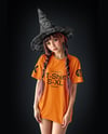 Young Woman Wearing Witch Hat and Oversized T-shirt Mockup
