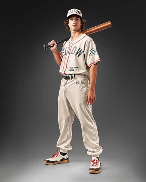 Young Man Wearing a Full Baseball Kit with Bat Mockup