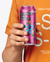 Man Wearing a T-shirt Holding 16oz Drink Can Mockup