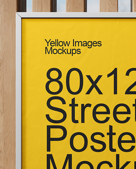 Framed Poster on a Wooden Wall Mockup