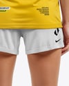 Female Soccer Player Wearing Jersey and Shorts Mockup