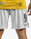 Soccer Player Wearing Jersey and Shorts Mockup