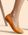 Pair of Leather Ballet Flats on Woman's Legs Mockup