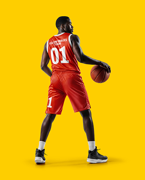 Basketball Player Wearing Jersey and Shorts with Basketball Mockup
