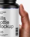 Plastic Pill Bottle in a Hand Mockup