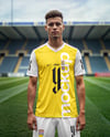 Soccer Player Wearing a Jersey and Shorts at the Stadium Mockup