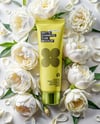 Matte Cosmetic Tube in Flowers Mockup