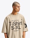 Man Wearing an Oversize T-shirt and Sweatpants Mockup