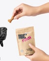 Dog and Hand Holding Stand-Up Pouch Mockup