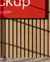 Billboard on a Wall with Wooden Slats Mockup